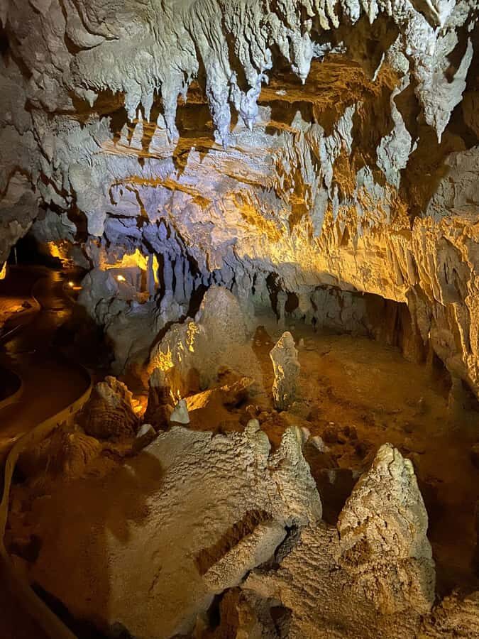 Auckland: Spellbound Glowworm Caves Explorer Tour - First Cave Stop: Geological Formations and the Cave Story