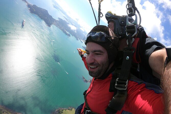 Bay of Islands: 9000ft Skydive - The Tandem Jump: Safety Gear, Instructor Control, and Photo Add-Ons