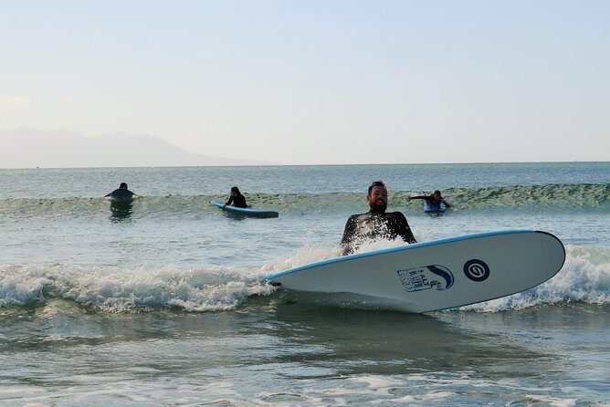 Beginner Surf Lesson at Te Arai Beach - The gear setup: wetsuit and surfboard (and how that helps)