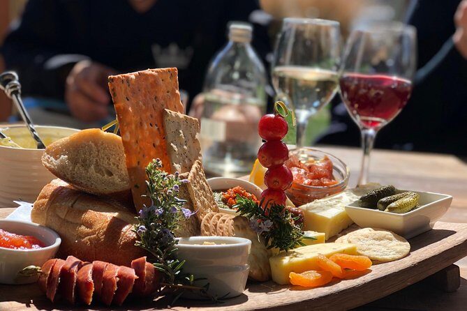 Bike & Wine Tour: Arrowtown to Valley of the Vines - Riding toward the wine region: rivers, bridges, and those climbs