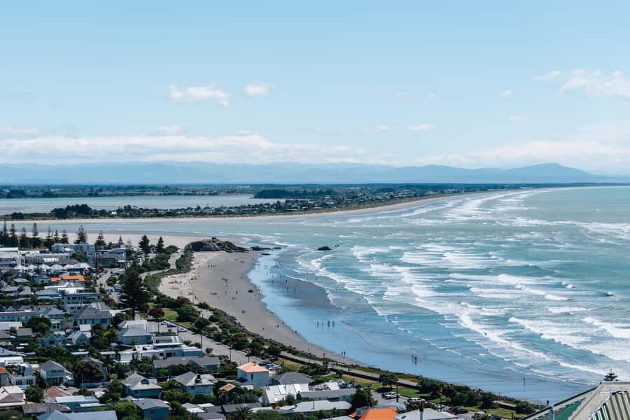 Christchurch: Guided Crater Rim Walk with Coastal Scenery - Gear and guide style: small inclusions that add up