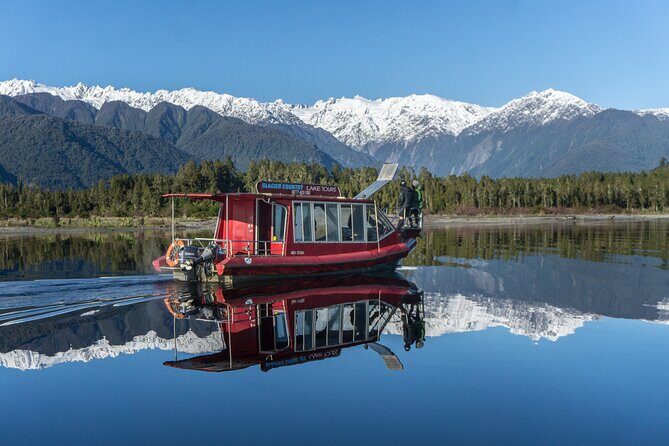 Cruise & Rainforest Walk - Franz Josef Glacier - Lake Mapourika on the water: reflections, birds, and that calm-before-the-forest feeling