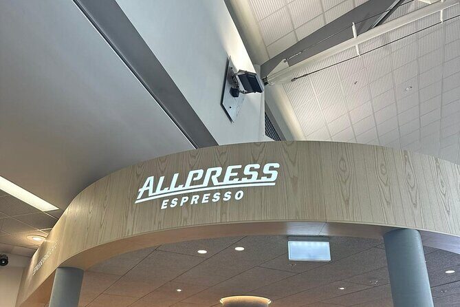 Direct & Quick Auckland Airport Transfer to/from Hotel in SUV - Meet-and-greet setup and the waiting clock at arrivals