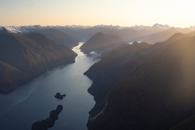 Doubtful And Dusky Sound Helicopter Scenic Flight from Te Anau - Dusky Sound landing: a wilder, more distant feeling