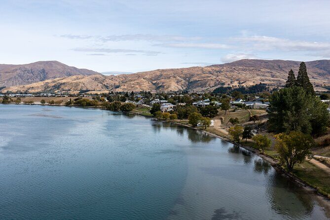 Dunedin to Queenstown One Way Tour Including Taieri Gorge Train - St Bathans Ghost Town Stop and the Blue Lake