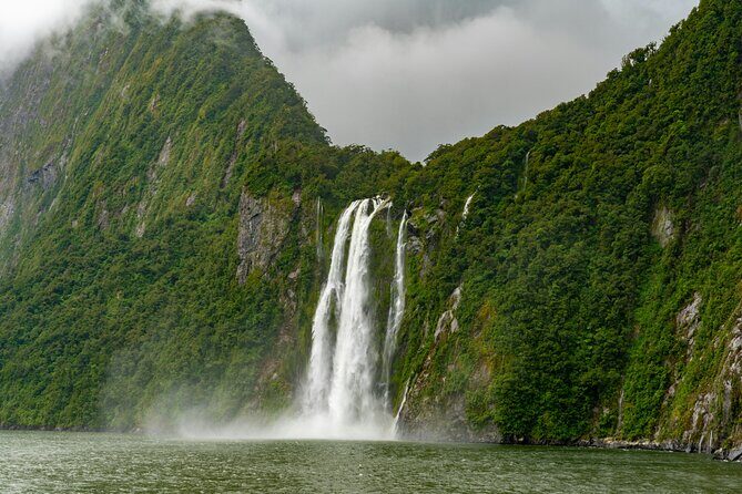 Epic Milford Guided Tour from Te Anau - Mirror Lakes Walk: quick reflections with Earl Mountains as the backdrop