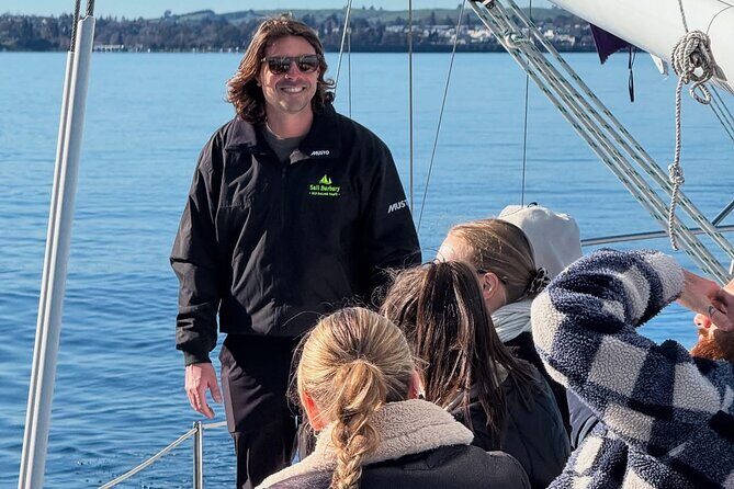 Evening Eco Sailing Adventure to Māori Rock Carvings Lake Taupō - Taupō District narration: crew energy, local context, and music onboard