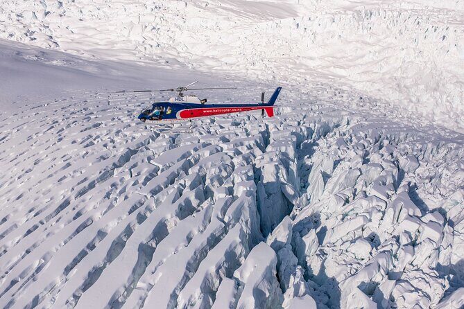 Fox Glacier: Neve Discoverer Helicopter Flight with Snow Landing - The flight itself: rainforests, ice-blue crevasses, and a smooth route