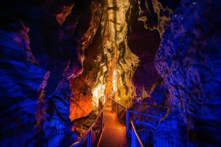 From Auckland: Waitomo Glowworm and Ruakuri Caves Day Tour - Ruakuri Cave: Spiral Entrance, Limestone Formations, and When Photos Are Allowed
