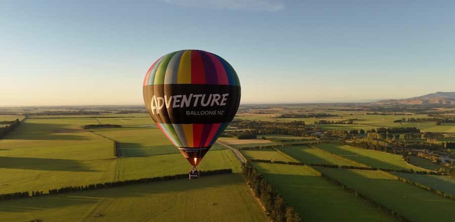 From Methven: Hot Air Balloon Flight in Canterbury with Wine - Getting to the launch paddocks: Main Street pickup and winter-ready shoes