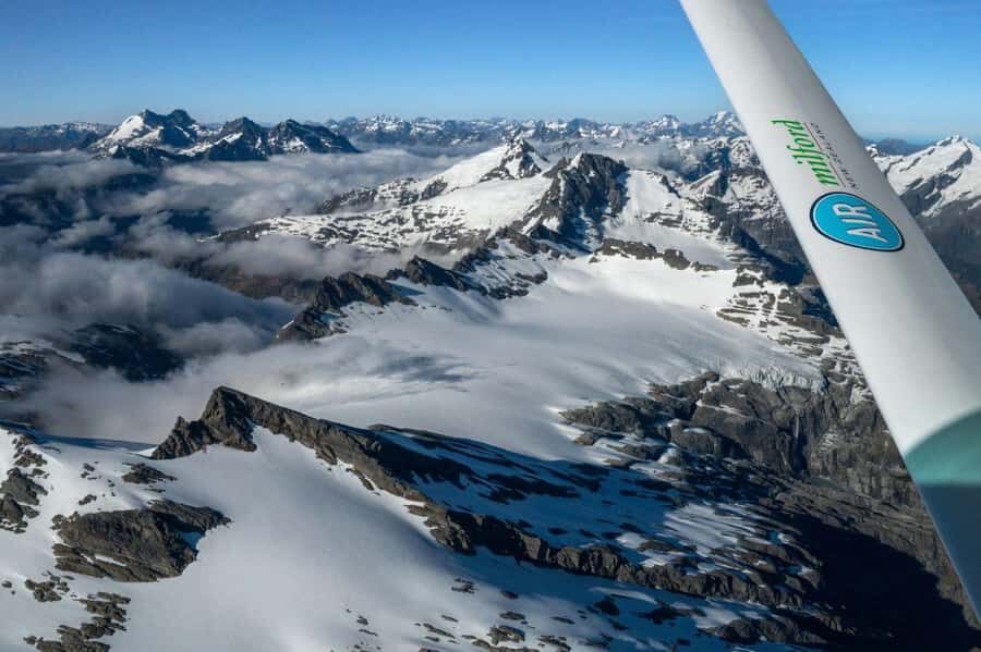 From Queenstown: Milford Sound Flight and Cruise with Lunch - Landing beneath Mitre Peak: the highlight moment in the sky