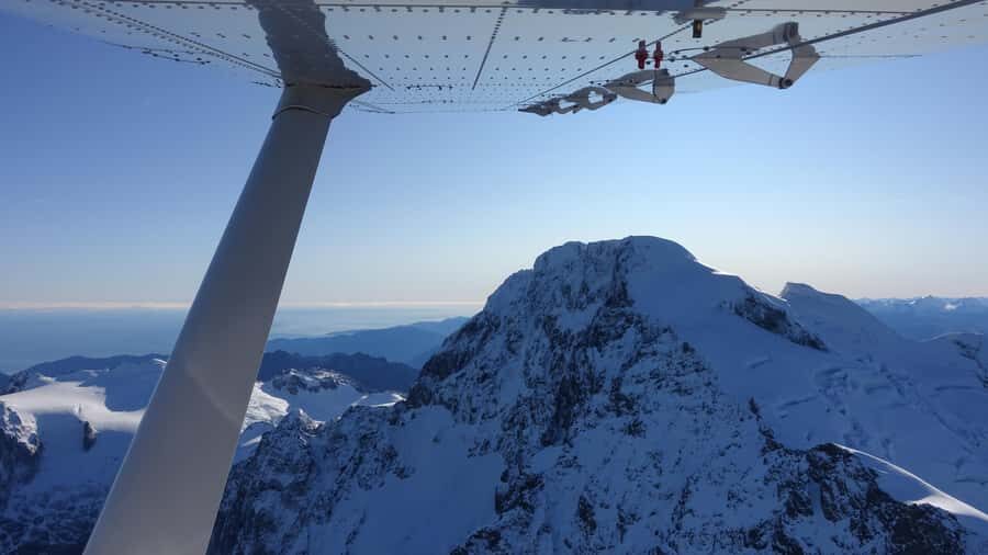 From Queenstown: Scenic Flight to Milford Sound - Crossing into Fiordland National Park and the glacier story