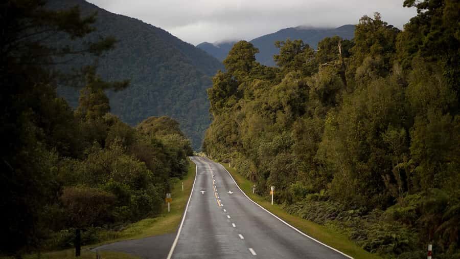 From Queenstown: Scenic One-Way Tour to Franz Josef - Haast Pass: beech forests, the Southern Alps, and why the windows matter