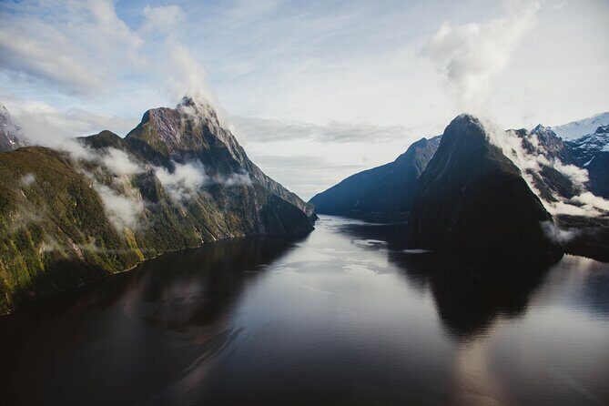 Glacier Galore Helicopter Scenic Flight from Milford Sound - Harrison’s Cove, cliffs, and alpine lakes: the scenery shifts fast