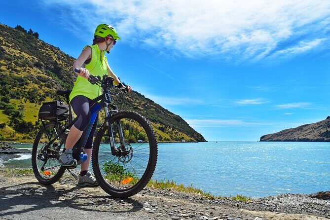 Guided Electric Mountain Bike Tour- Akaroa Explorer - The lighthouse area and cultural sights: a guided way to see more thoughtfully