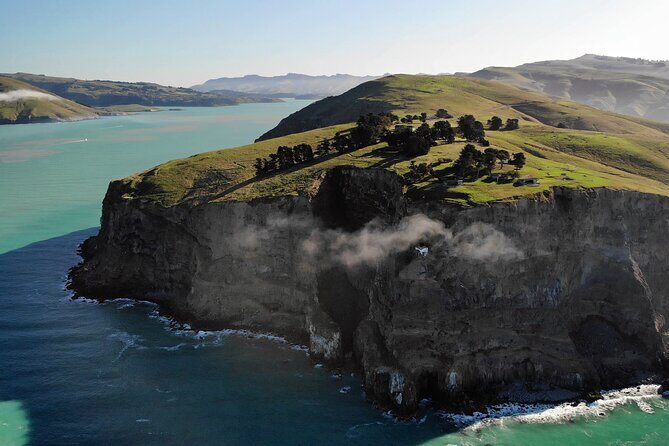 Luxury Private Guided Crater Rim Walk on Banks Peninsula - Stop 1: Sumner Beach and Cave Rock for an easy seaside start
