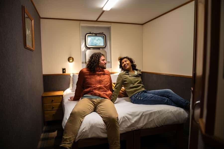 Milford Sound: Overnight Cruise with Water Activities - Boarding the Milford Mariner: Cabins, Guides, and Real Time Aboard