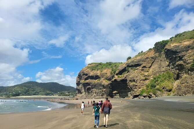 Private Auckland West Coast Tour Piha Beach and Karekare Falls - Piha Beach: black sand, surfers, and a classic West Coast finish