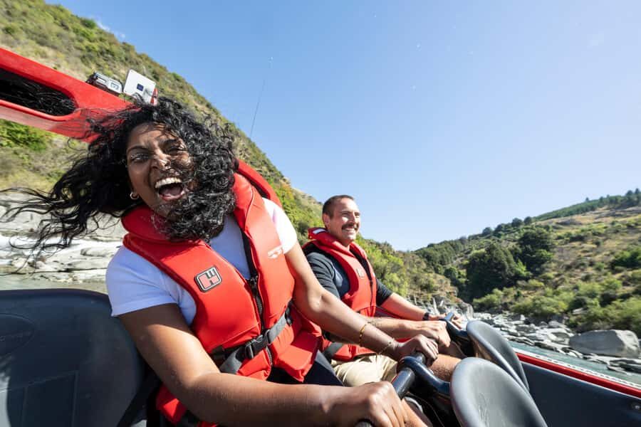 Queenstown: Shotover River Extreme Jet Boat Experience - Onboard setup: life jackets, lockers, and winter comfort