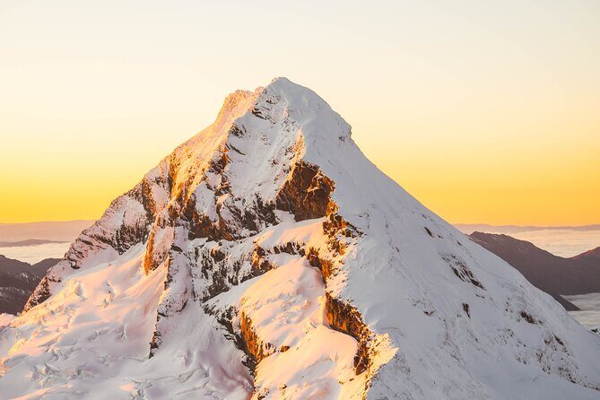 Queenstown Sunrise Glacier Scenic Flight by Glenorchy Air - Mt. Aspiring at first light: the moment the sun breaks