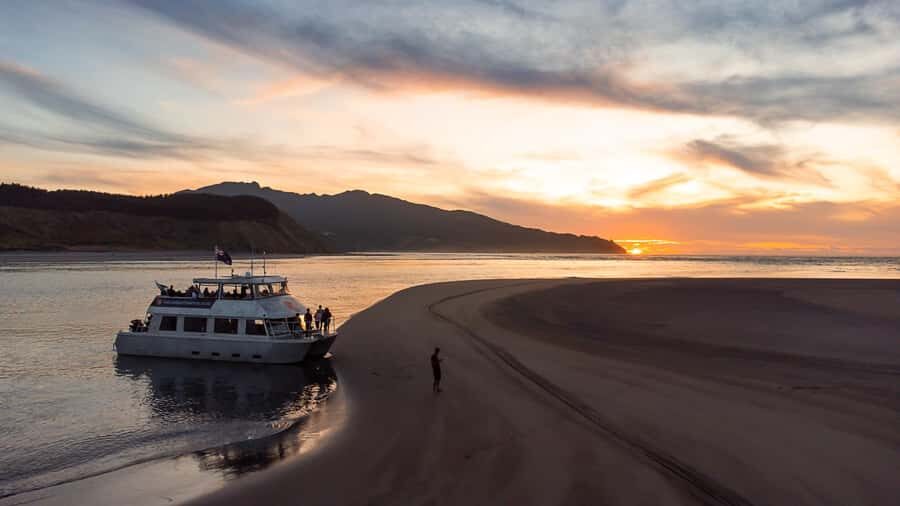 Raglan: Scenic Harbour Sunset Cruise - The heart of the trip: pancake rocks and karst up close
