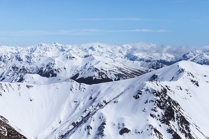 Southern Alps Scenic - Over the Waimakariri River: where braided rivers look unreal
