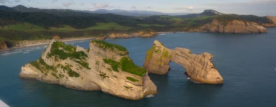 Takaka: Farewell Spit/Abel Tasman Scenic Flight - Northern Abel Tasman Beaches and Awaroa Estuary: Where the Colors Shift