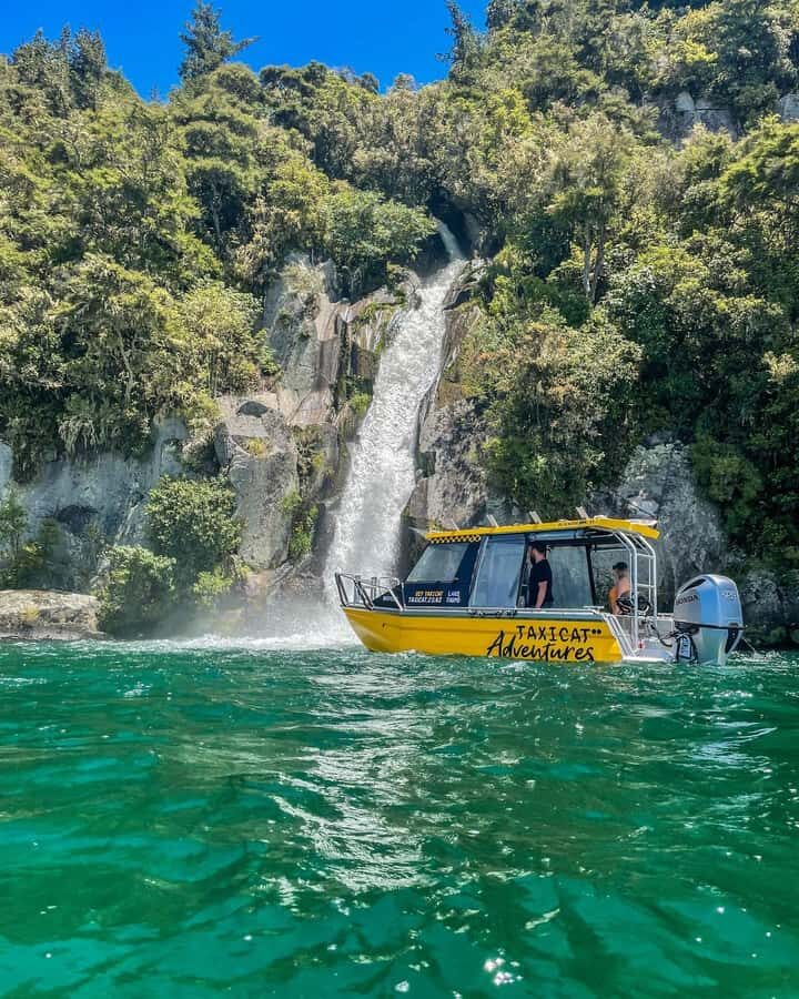 Taupo: Lake Taupo Western Bays Catamaran Tour with Bush Walk - Rocky shoreline cruising: cliffs, hidden falls, and the art of the quick photo stop