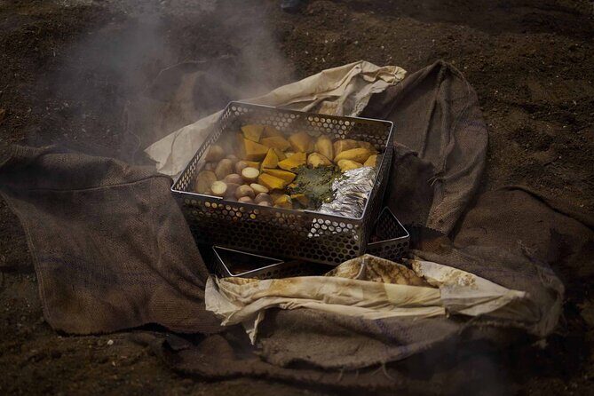 Te Puia: Te Pō Indigenous Evening Experience with Dinner - Te Puia at dusk: the wharenui welcome plus a geothermal valley that changes by the minute