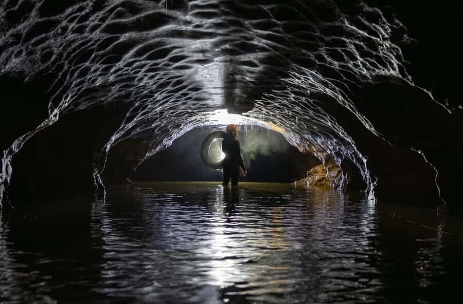 The Waitomo Experience : Okohua Glowworm Cave Tour - Underground movement: wading pools, narrow gaps, and limestone shapes