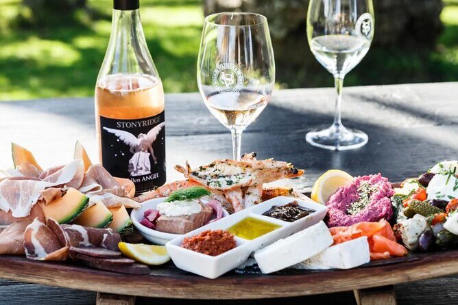 Waiheke Island: Taste&Graze Whisky Cellar Tour, Food, Olive Oil - Batch Winery lunch moment: a glass plus a bespoke platter