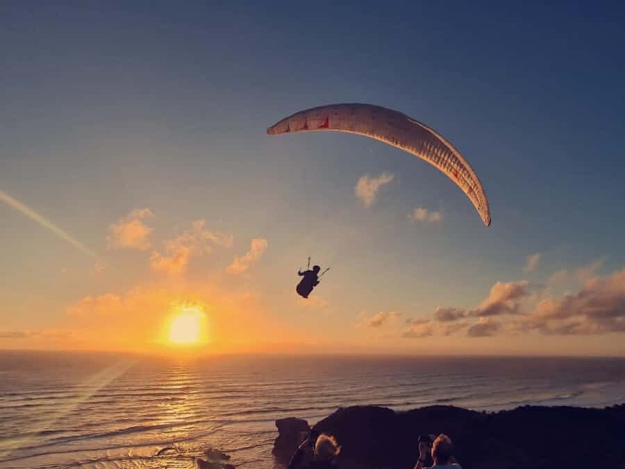 West Auckland: Sunset with Thermal pool & Wine Tasting - Muriwai Beach Sunset: Where the Sky Does the Work